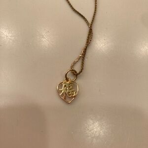 Necklace with Chinese symbol pendant!